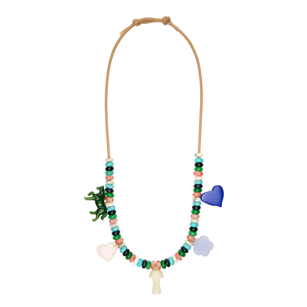 beaded tan string necklace with assorted stones and charms