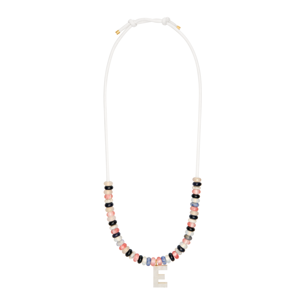 styled stone necklace with colorful beads and letter charm